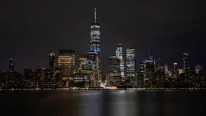 city with high-rise buildings during night time jigsaw puzzle