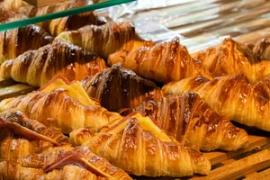 a bunch of croissants that are sitting on a table jigsaw puzzle