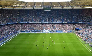 people inside soccer stadium during day jigsaw puzzle