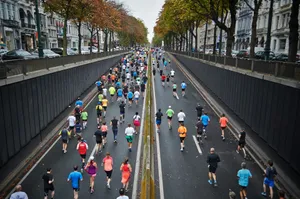 people running on road during daytime jigsaw puzzle