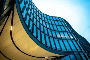 a curved building with a sky background jigsaw puzzle
