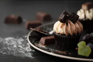 Decadent chocolate cupcake with rich cream and chocolate chunks, perfect for indulgence. jigsaw puzzle