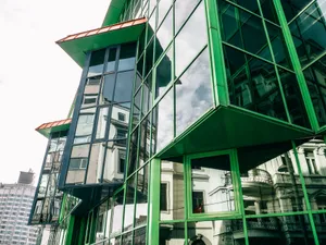 Green glass facade reflecting urban Istanbul architecture in a modern style. jigsaw puzzle