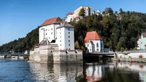 Discover the historic beauty of Passau's castles reflected in tranquil river waters. jigsaw puzzle