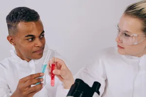 Two scientists in lab coats discussing results with test tubes in a laboratory setting. jigsaw puzzle