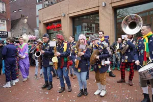 Colorful street band performing during a vibrant carnival parade in Holland. jigsaw puzzle