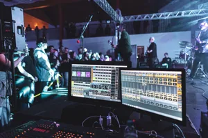 Live concert scene with sound engineering setup and band on stage. jigsaw puzzle