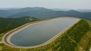 a large dam with a river running through it jigsaw puzzle