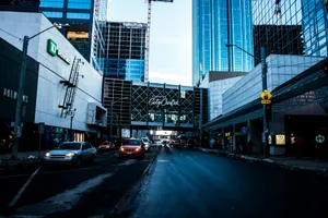 cars on road near buildings during daytime jigsaw puzzle
