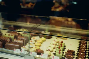 Assortment of delicious pastries in a display case. jigsaw puzzle