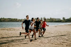 men and women running on sea shore jigsaw puzzle
