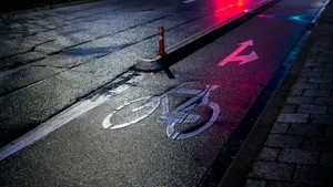 red and black traffic light on gray asphalt road jigsaw puzzle