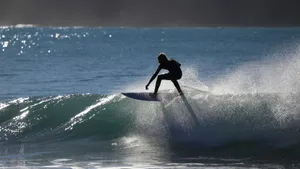 person riding surfboard on water barrel jigsaw puzzle