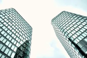 a couple of tall buildings sitting next to each other jigsaw puzzle