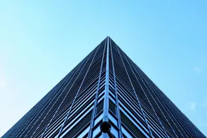 a tall building with a blue sky jigsaw puzzle