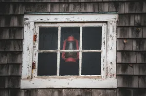 Red lantern hanging in a window jigsaw puzzle