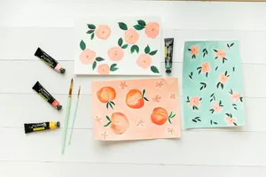 a white table topped with cards and paint jigsaw puzzle