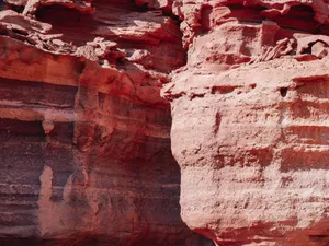 Vivid red sandstone rock formations highlighting natural geological patterns. jigsaw puzzle