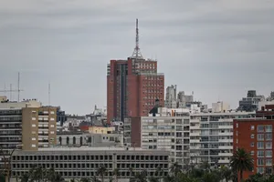 Skyline view of Montevideo with prominent building and antenna amidst urban architecture. jigsaw puzzle