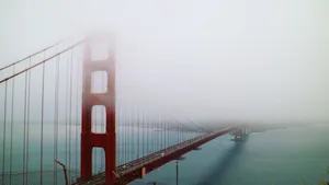 Ethereal view of San Francisco's Golden Gate Bridge shrouded in fog. jigsaw puzzle