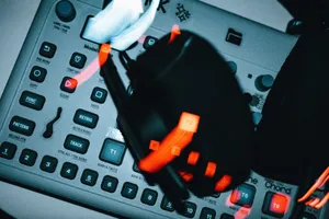 Blurred dynamic shot of buttons and controls on modern music production equipment with glowing lights. jigsaw puzzle
