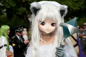 A striking cosplay character with unique costume at an outdoor convention setting. jigsaw puzzle