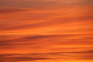 a plane flying in the sky at sunset jigsaw puzzle