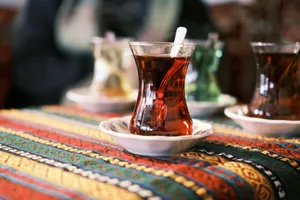 a cup of tea on a plate on a table jigsaw puzzle