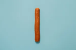 hot dog on teal surface jigsaw puzzle