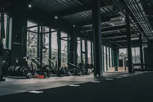 A large gym with a lot of machines jigsaw puzzle