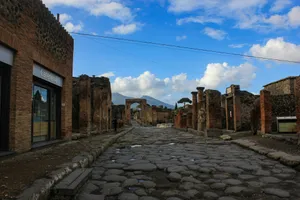 A cobblestone street with a sky background jigsaw puzzle