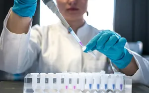 scientist using pipette with test tubes in lab jigsaw puzzle