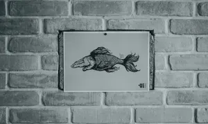 Drawing of a fish on a brick wall jigsaw puzzle