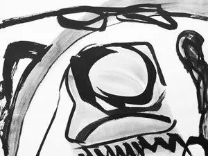 Abstract black and white brush strokes create a face jigsaw puzzle